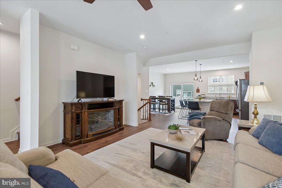 1813 Iris Lane Hanover, MD 21076 - Photo 10 of 20 a living room with furniture and a flat screen tv