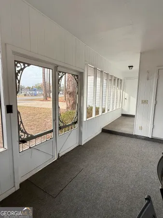 a house with trees in the background