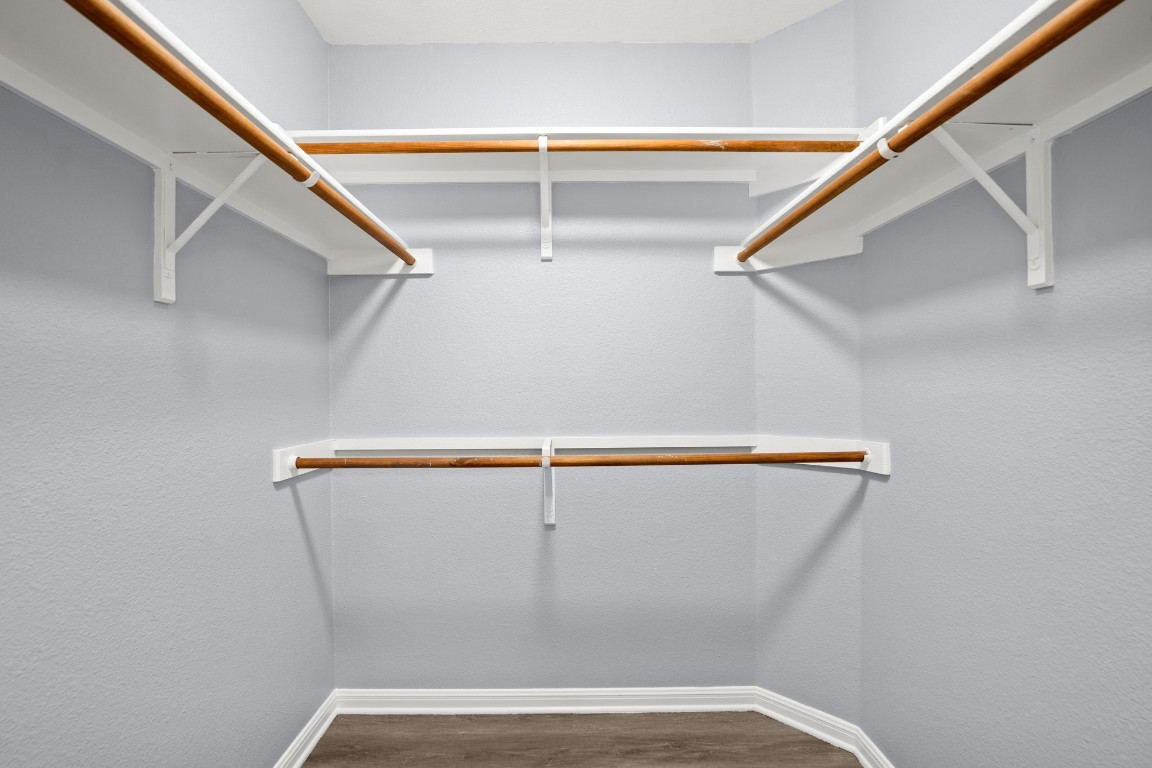 14303 Cummins Way Manor, TX 78653 - Photo 16 of 25 a view of walk in closet