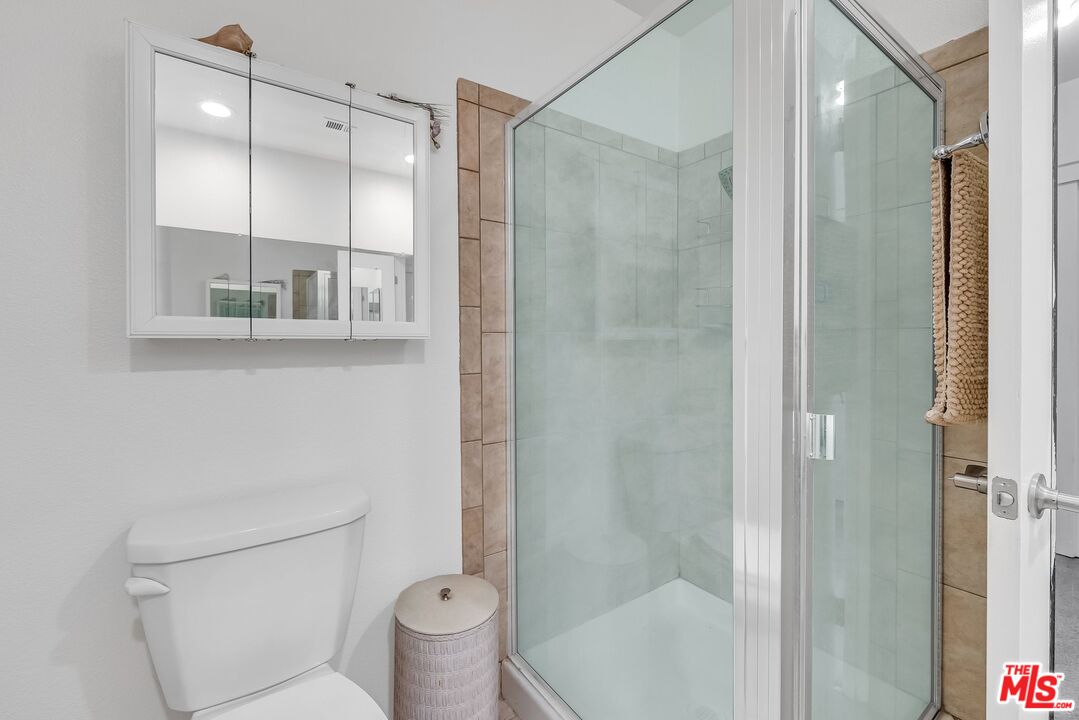 2774 Monticello Road Claremont, CA 91711 - Photo 25 of 34 a bathroom with a shower and a toilet