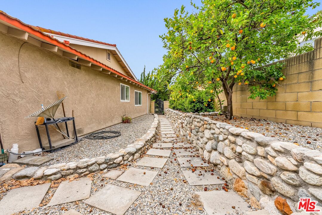 2774 Monticello Road Claremont, CA 91711 - Photo 29 of 34 a front view of a house with a yard