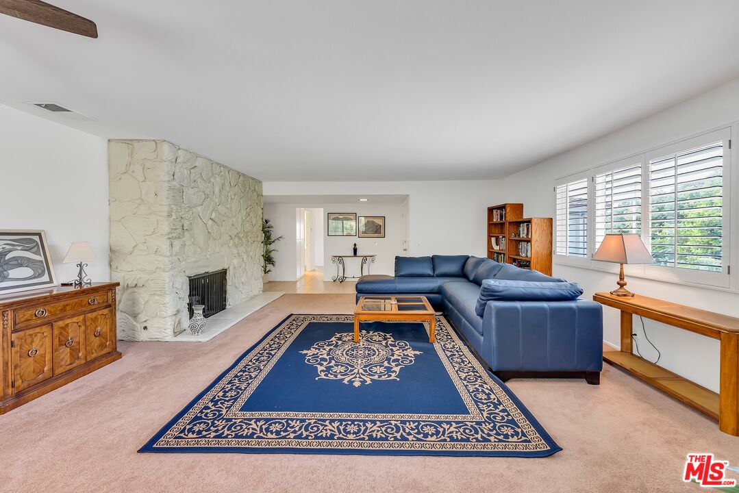 2774 Monticello Road Claremont, CA 91711 - Photo 6 of 34 a living room with furniture and a fireplace