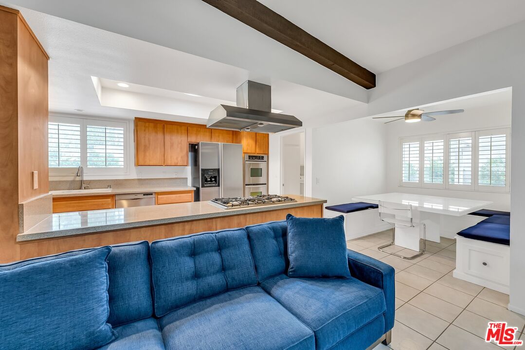 2774 Monticello Road Claremont, CA 91711 - Photo 10 of 34 a living room with furniture and a large window