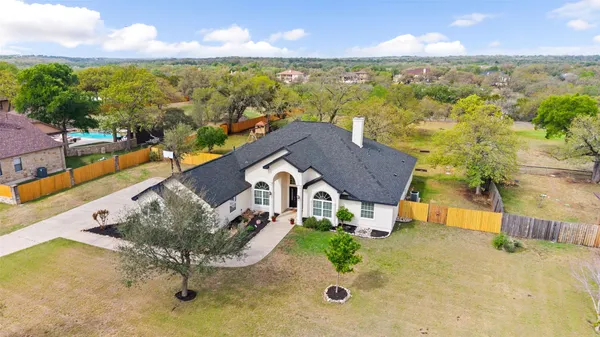 $945,000 | 744 Bartlett Drive West, Buda, TX 78610