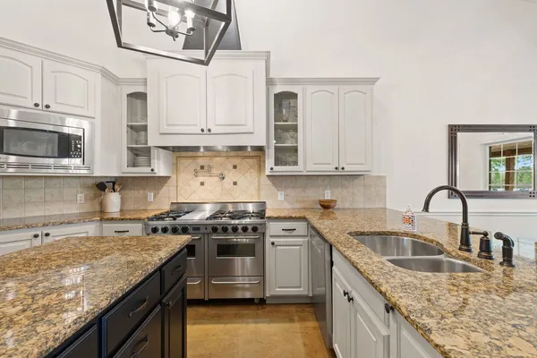 $945,000 | 744 Bartlett Drive West, Buda, TX 78610