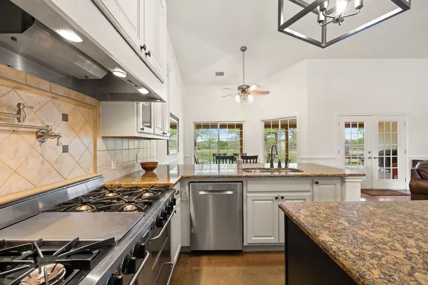 $945,000 | 744 Bartlett Drive West, Buda, TX 78610