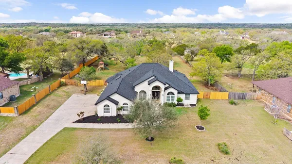 $945,000 | 744 Bartlett Drive West, Buda, TX 78610