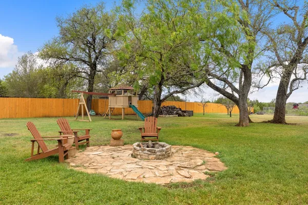$945,000 | 744 Bartlett Drive West, Buda, TX 78610
