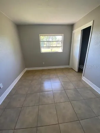 a view of a livingroom with a window