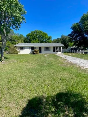 a house view with a garden space