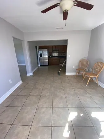 a view of a livingroom with furniture and window