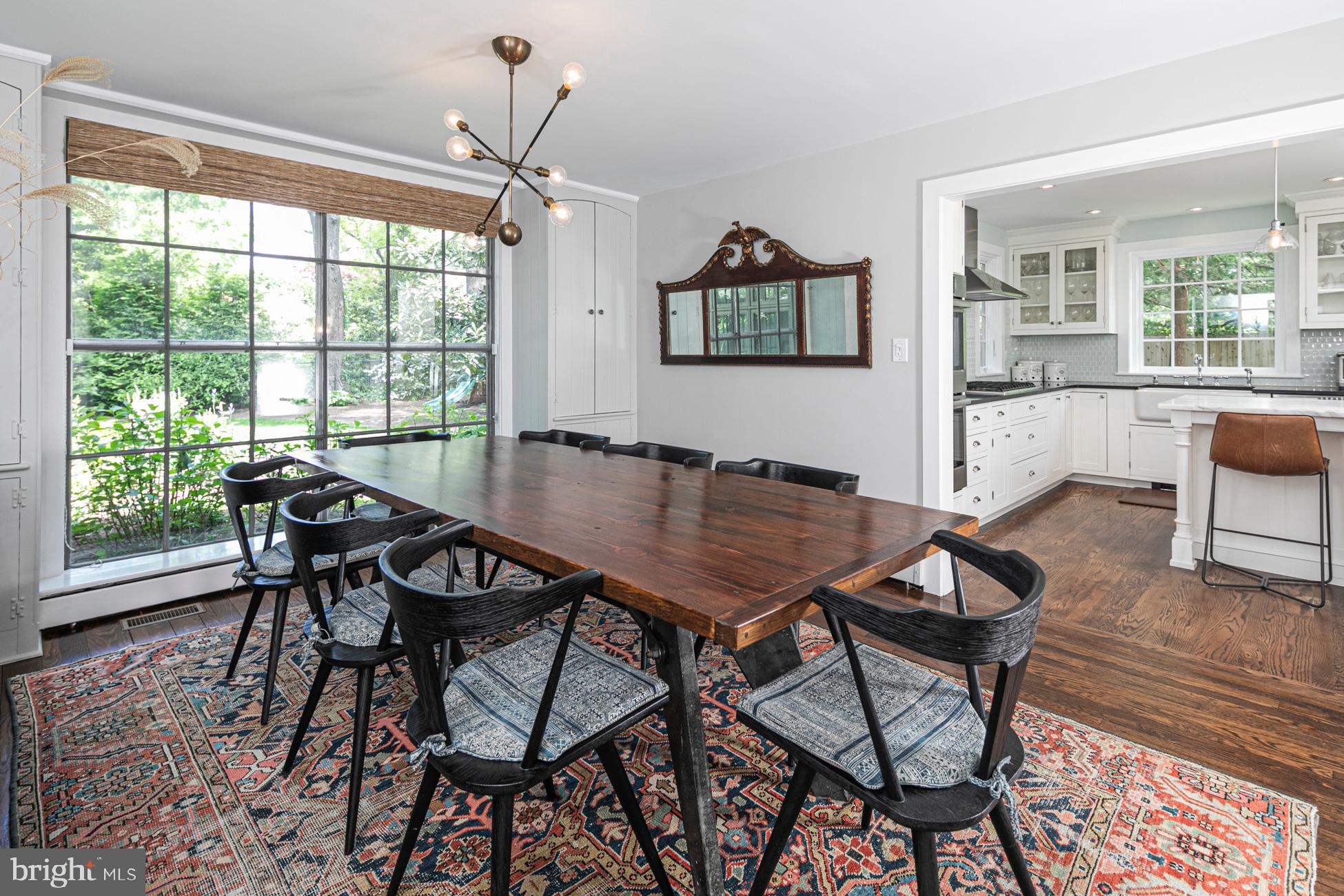 23 Hodge Road Princeton, NJ 08540 - Photo 12 of 34 a view of a dining room with furniture window and wooden floor