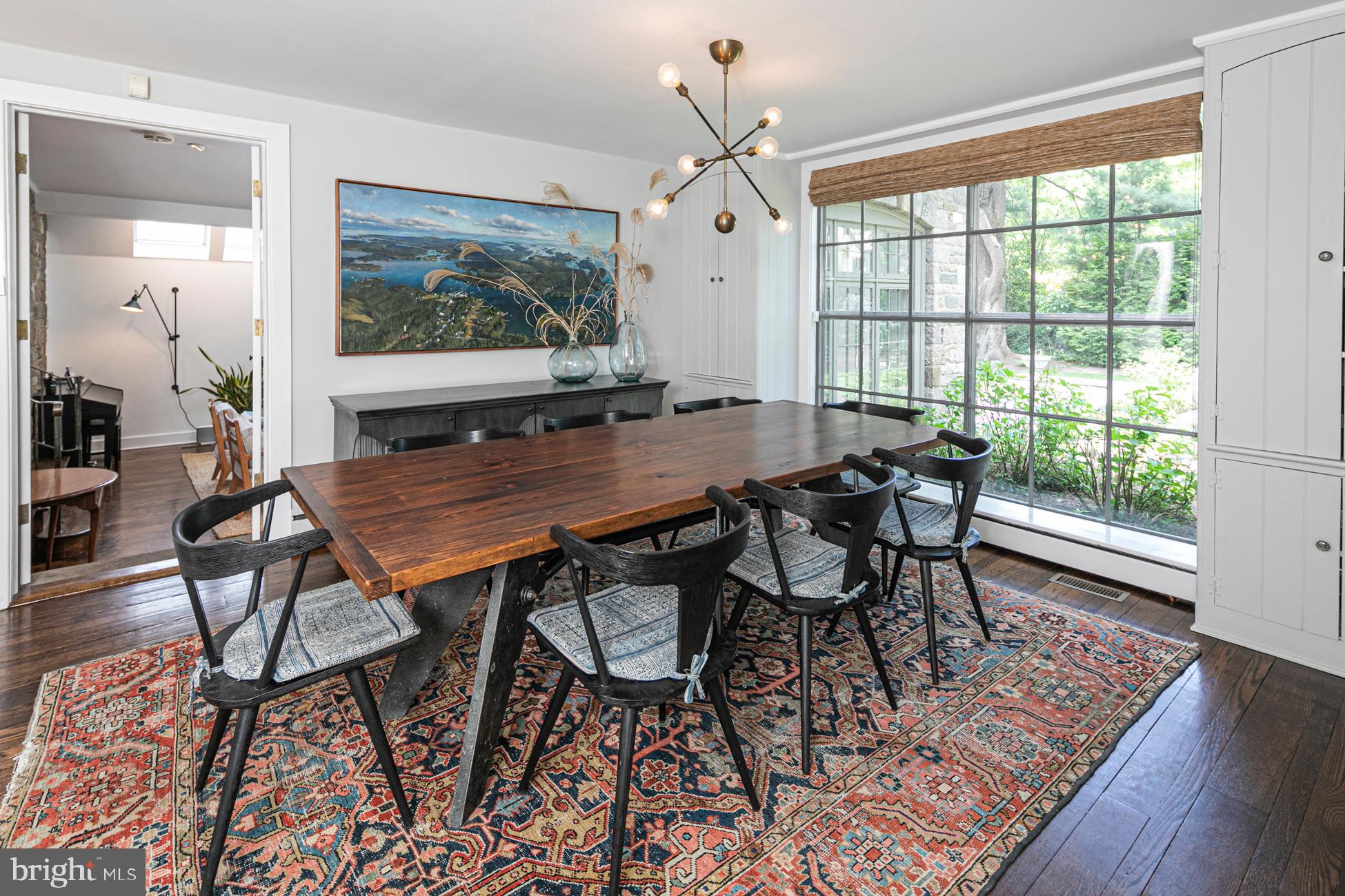23 Hodge Road Princeton, NJ 08540 - Photo 13 of 34 a view of a dining room with furniture wooden floor and a rug