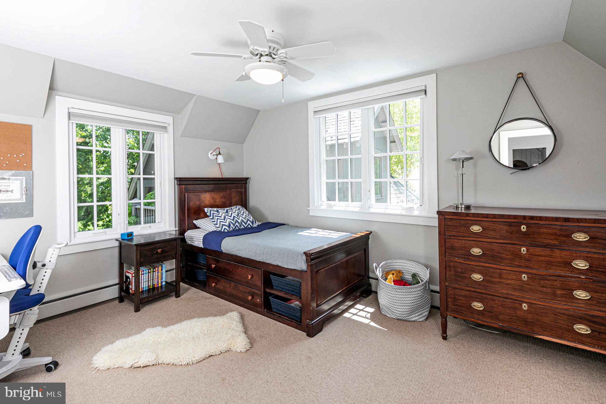 23 Hodge Road Princeton, NJ 08540 - Photo 24 of 34 a living room with a bed furniture and a window