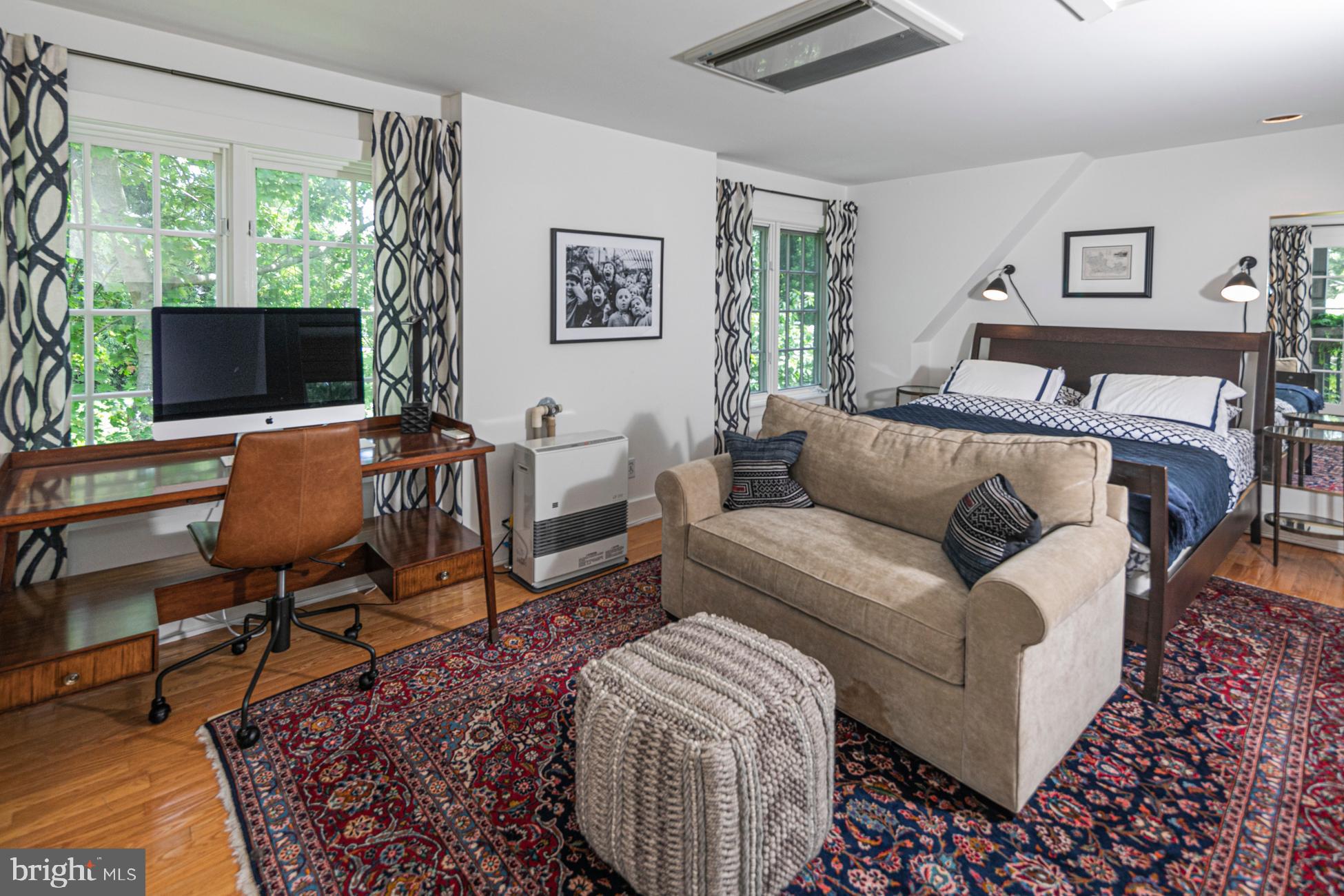 23 Hodge Road Princeton, NJ 08540 - Photo 27 of 34 a bedroom with furniture and a flat screen tv