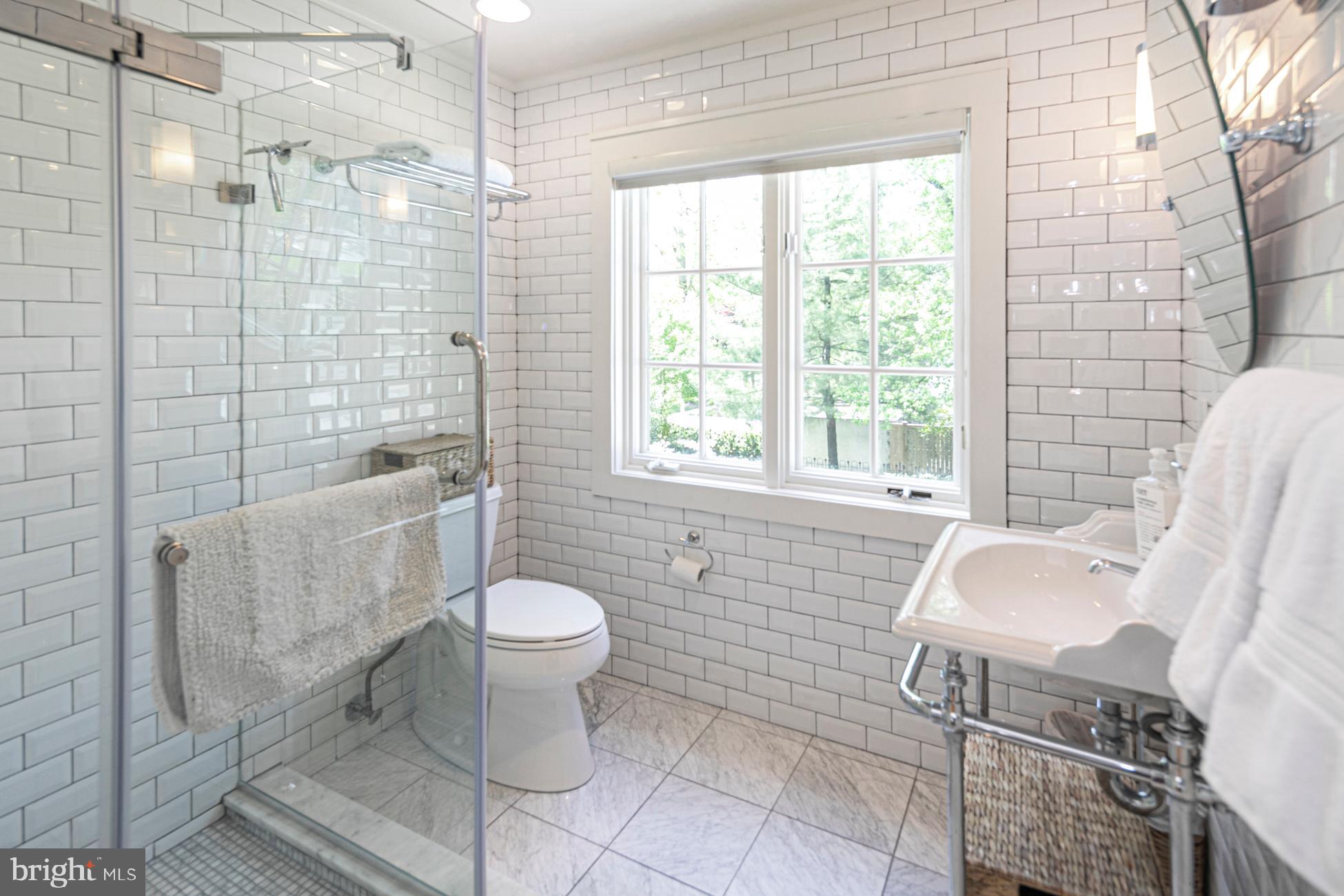 23 Hodge Road Princeton, NJ 08540 - Photo 28 of 34 a bathroom with a toilet sink and shower