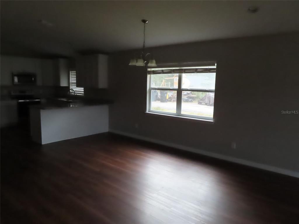 2501 Shirah Road Auburndale, FL 33823 - Photo 6 of 17 a view of an empty room with a window