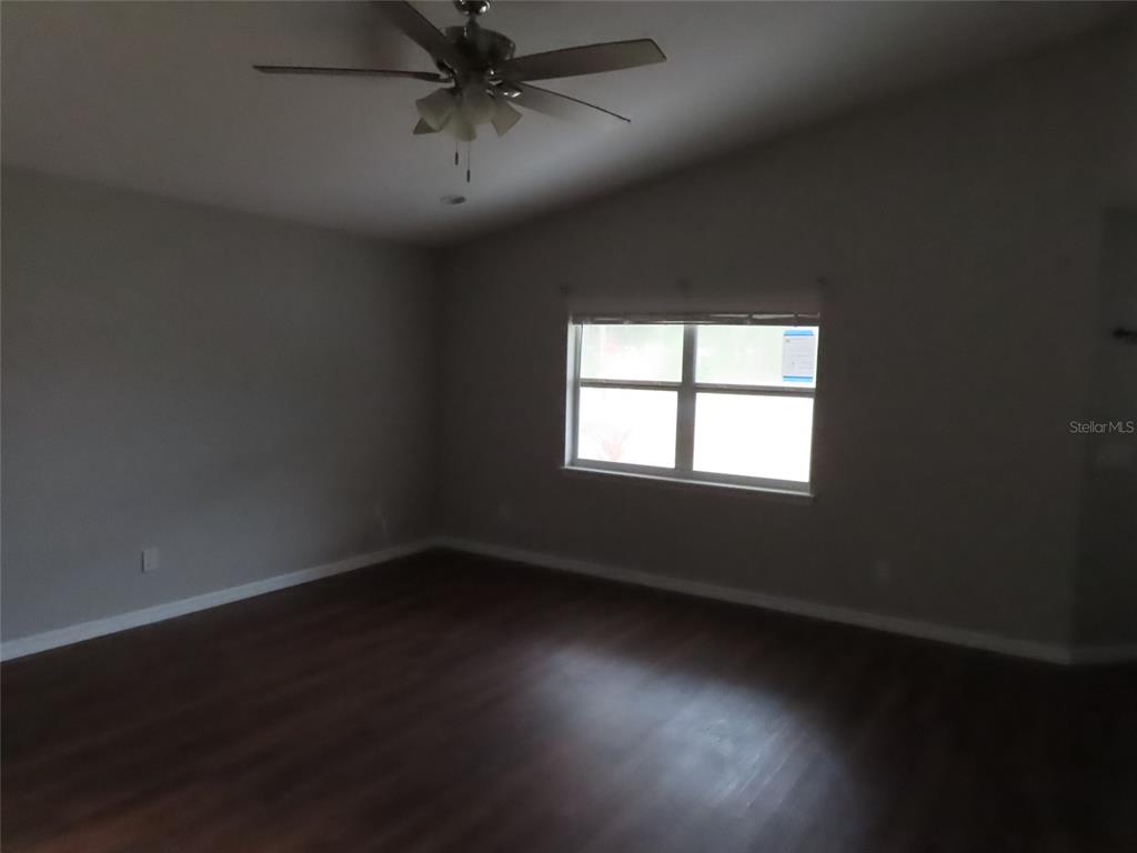 2501 Shirah Road Auburndale, FL 33823 - Photo 7 of 17 an empty room with a window