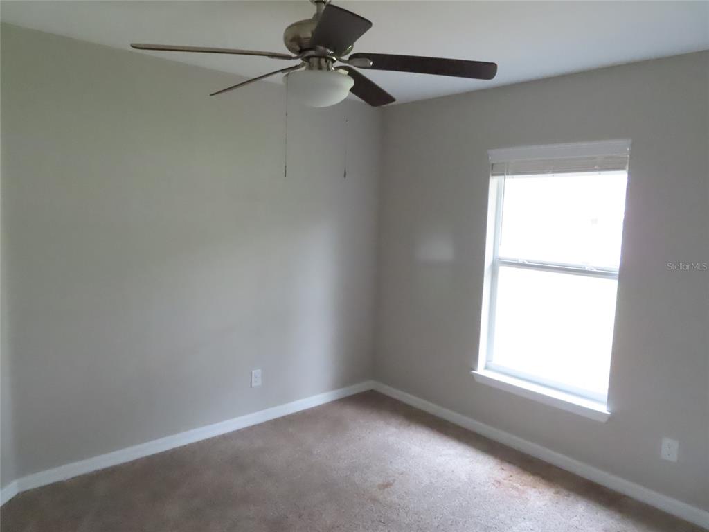 2501 Shirah Road Auburndale, FL 33823 - Photo 10 of 17 an empty room with a window