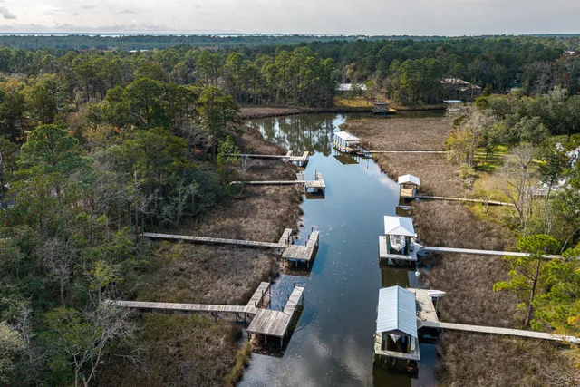 an aerial view of houses with yard