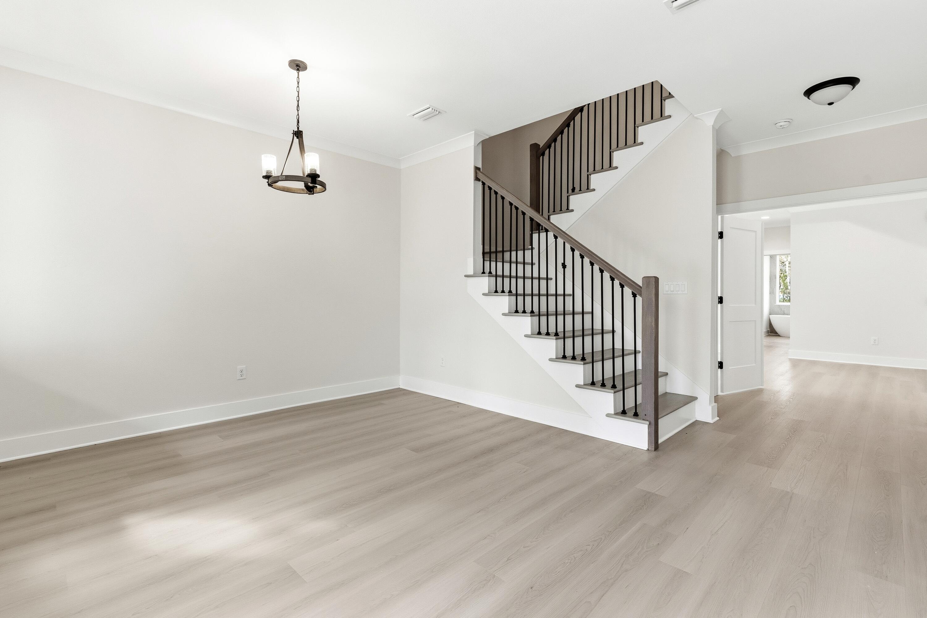 151 Redfish Pt Drive Freeport, FL 32439 - Photo 16 of 40 a view of empty room with stairs