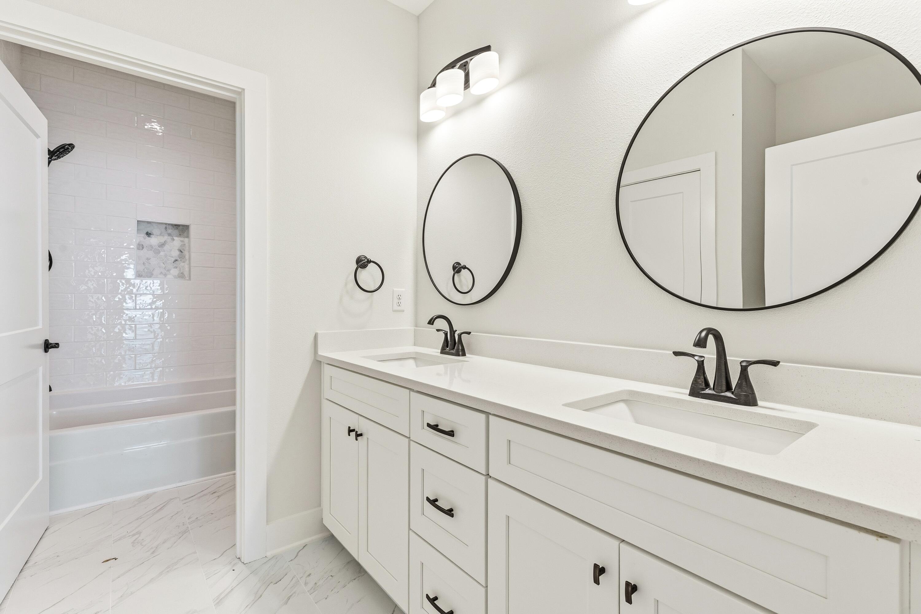 151 Redfish Pt Drive Freeport, FL 32439 - Photo 33 of 40 a bathroom with a sink and a mirror