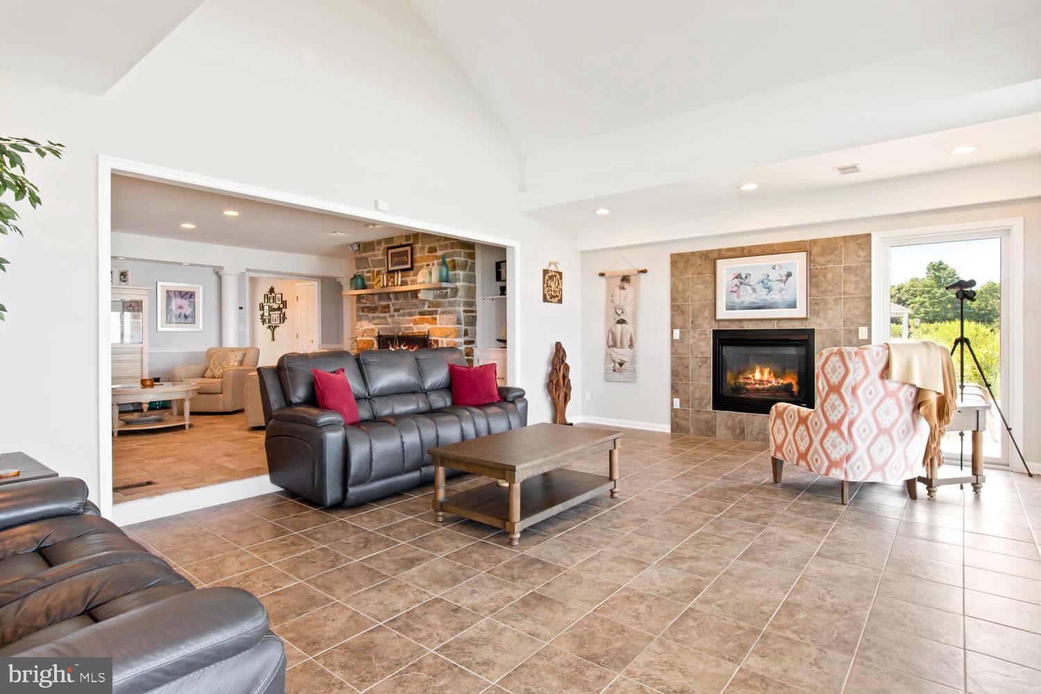 3204 Bennett Point Road Queenstown, MD 21658 - Photo 15 of 54 Waterfront Living Room with Modern Fireplace