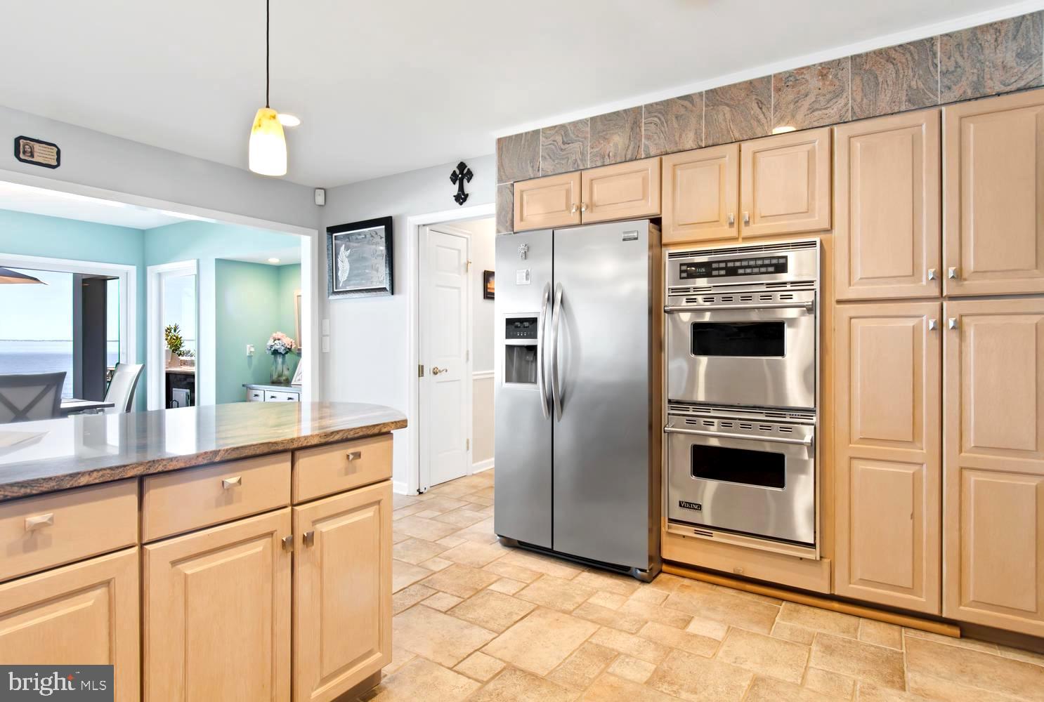 3204 Bennett Point Road Queenstown, MD 21658 - Photo 20 of 54 Custom Cabinetry . Sleek Stainless Appliances