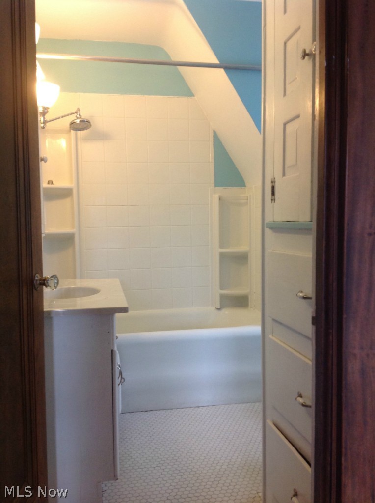 1241 Ridge Road Northwest Canton, OH 44703 - Photo 9 of 11 Lovely fresh white bathroom