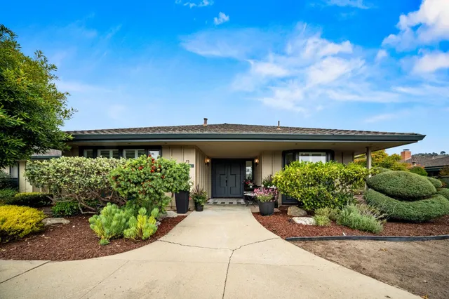 a house view with a garden space