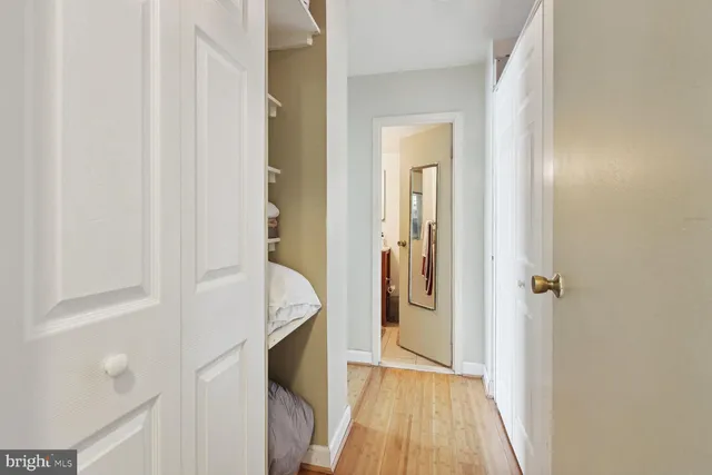a view of a bathroom from a hallway