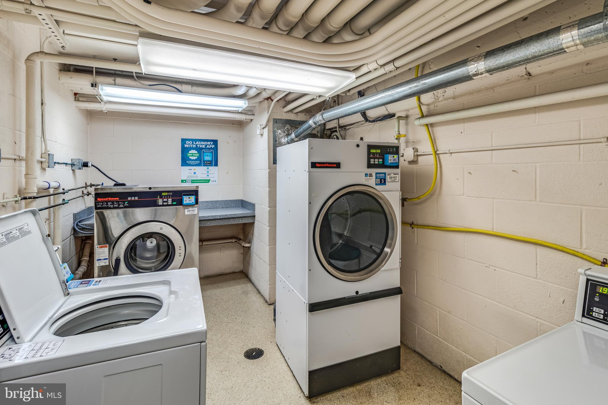 950 25th Street Northwest, Unit 608N Washington, DC 20037 - Photo 13 of 38 a utility room with dryer and washer