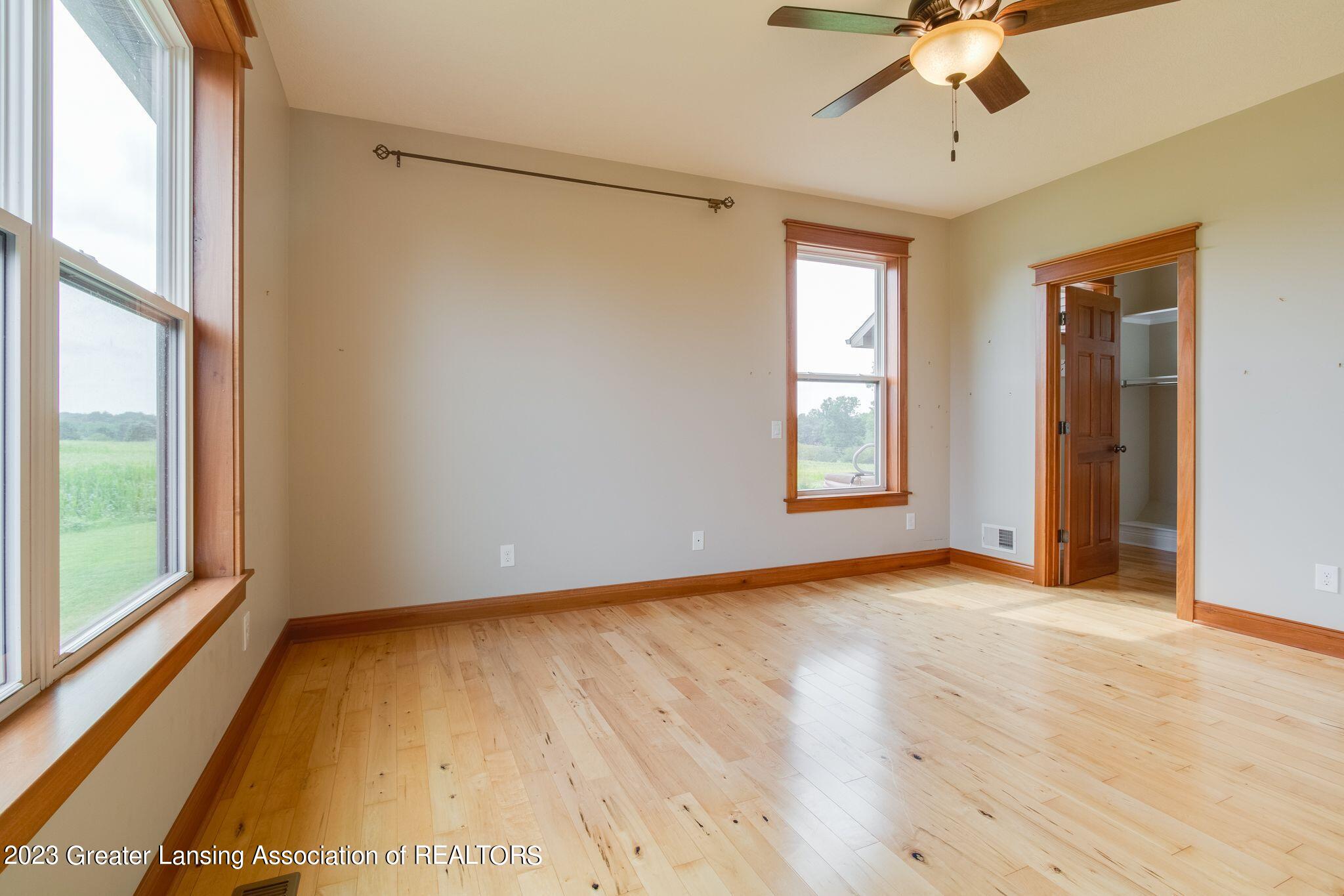 4600 East Clark Road Bath, MI 48808 - Photo 21 of 37 Primary Bedroom