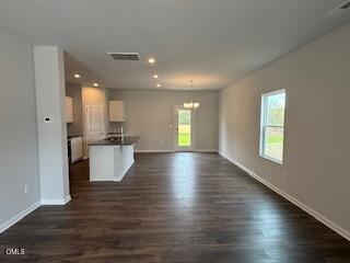 41 Stout Landing Dunn, NC 28334 - Photo 12 of 33 a view of kitchen with furniture and wooden floor