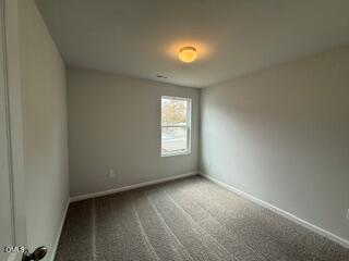 41 Stout Landing Dunn, NC 28334 - Photo 21 of 33 a view of an empty room with a window