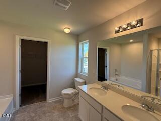 41 Stout Landing Dunn, NC 28334 - Photo 24 of 33 a bathroom with a granite countertop sink toilet and shower