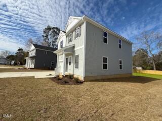 41 Stout Landing Dunn, NC 28334 - Photo 3 of 33 a front view of a house with a yard