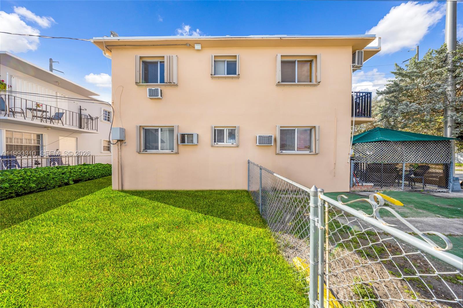 955 West 23rd Street Hialeah, FL 33010 - Photo 13 of 16 a view of backyard with deck