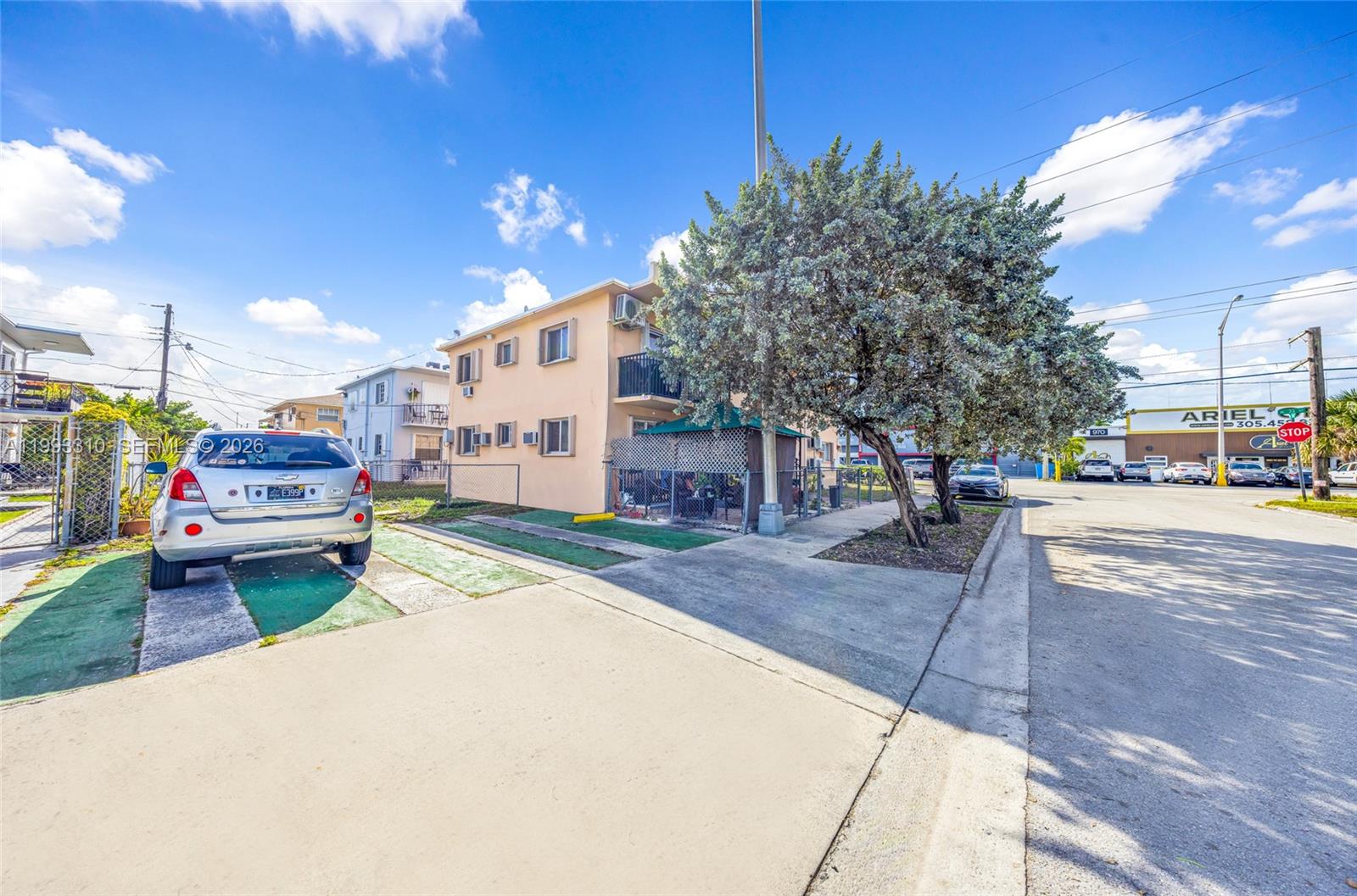 955 West 23rd Street Hialeah, FL 33010 - Photo 16 of 16 a street view with a building in the background