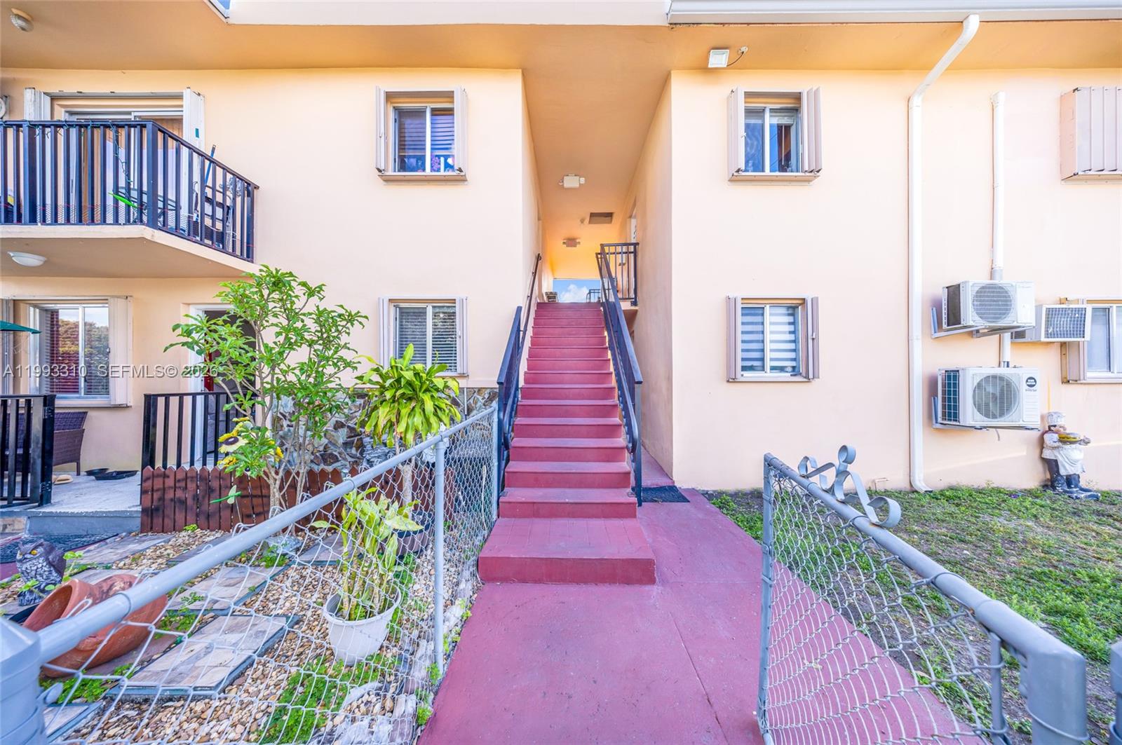 955 West 23rd Street Hialeah, FL 33010 - Photo 5 of 16 a front view of a house with a yard