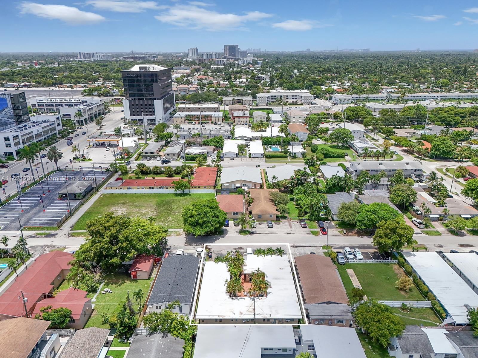 700 Northeast 6th Street Hallandale Beach, FL 33009 - Photo 4 of 15 an aerial view of residential houses with outdoor space