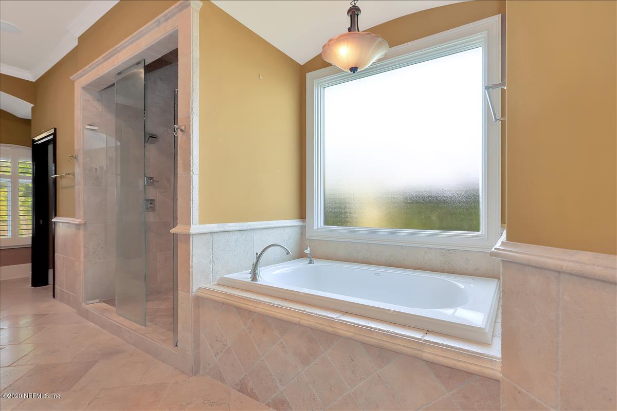 96270 Captains Pointe Road Yulee, FL 32097 - Photo 15 of 34 a bathroom with a tub and a sink