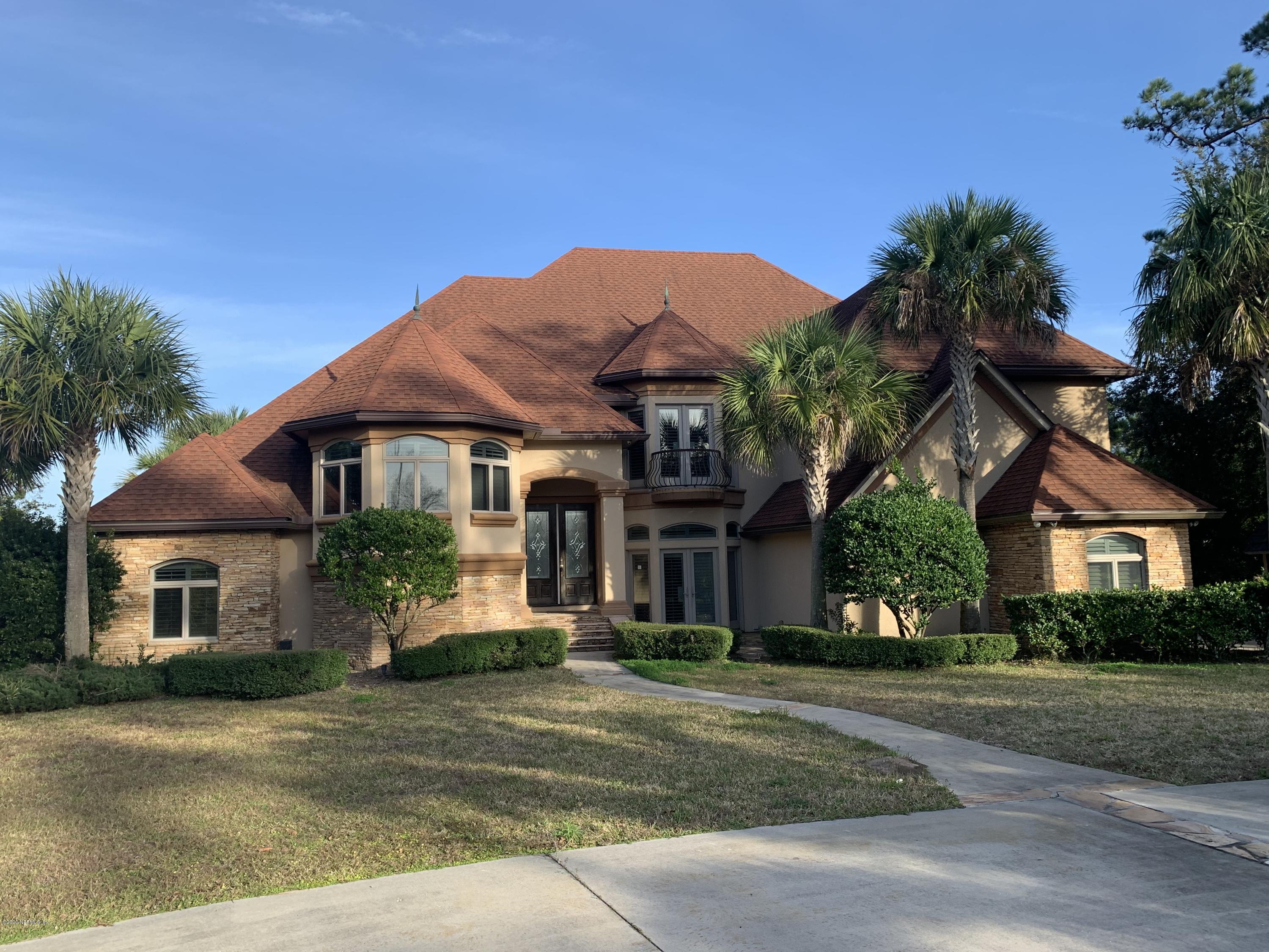 96270 Captains Pointe Road Yulee, FL 32097 - Photo 32 of 34 a front view of a house with a yard