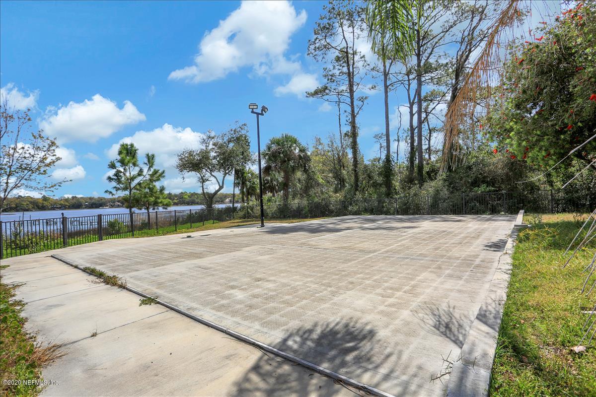 96270 Captains Pointe Road Yulee, FL 32097 - Photo 33 of 34 a view of a backyard