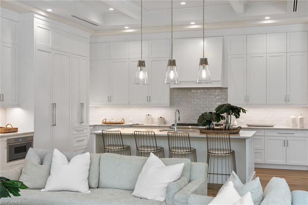 1191 7th Avenue North Naples, FL 34102 - Photo 15 of 49 High End Cabinets to the Ceiling and Extra Lighting for cooking enjoyment