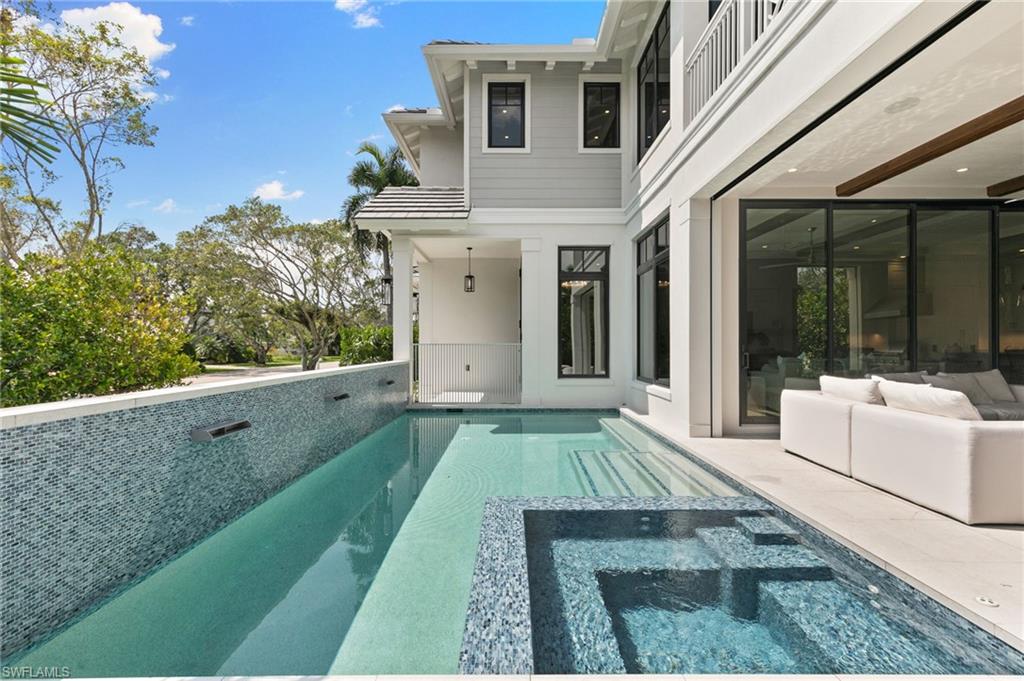 1191 7th Avenue North Naples, FL 34102 - Photo 23 of 49 Spa completely encased in tiny blue tiles is waiting for a Bedtime treat