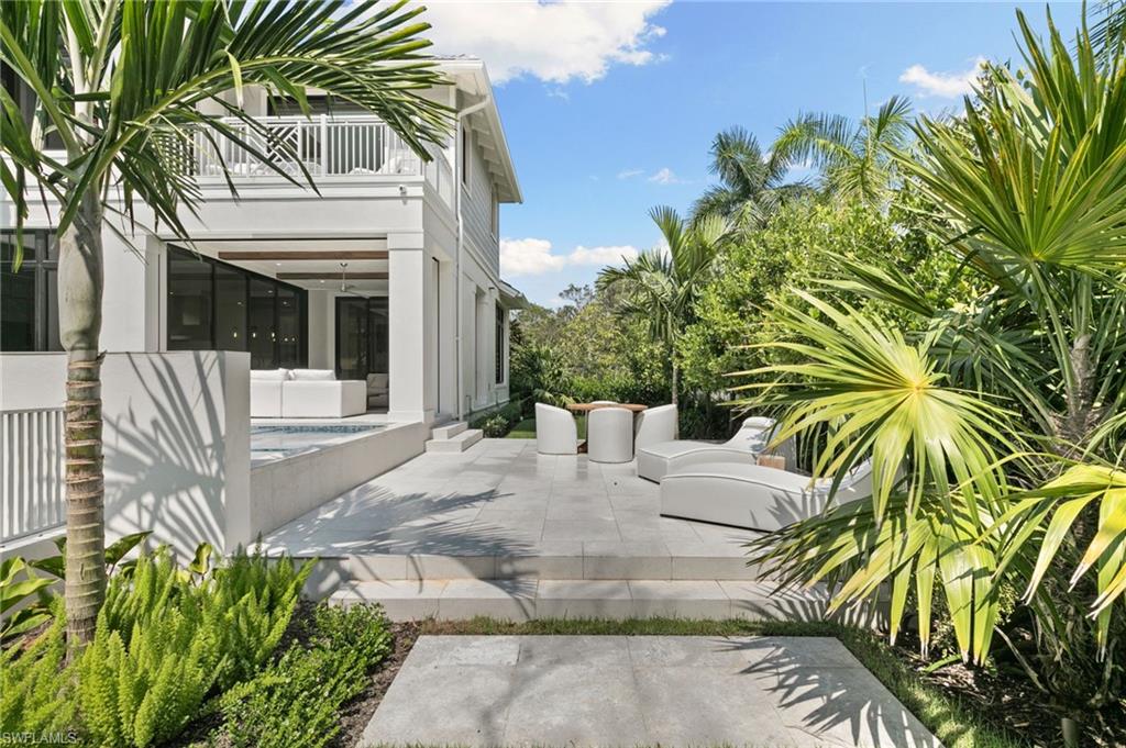 1191 7th Avenue North Naples, FL 34102 - Photo 24 of 49 Large Marble Deck offer consistent Sunshine for those Sunbathers