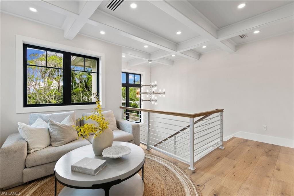 1191 7th Avenue North Naples, FL 34102 - Photo 32 of 49 Atop the Staircase on the 2nd Floor, is an enchanting Reading/Coffee Nook with Morning Bar nearby