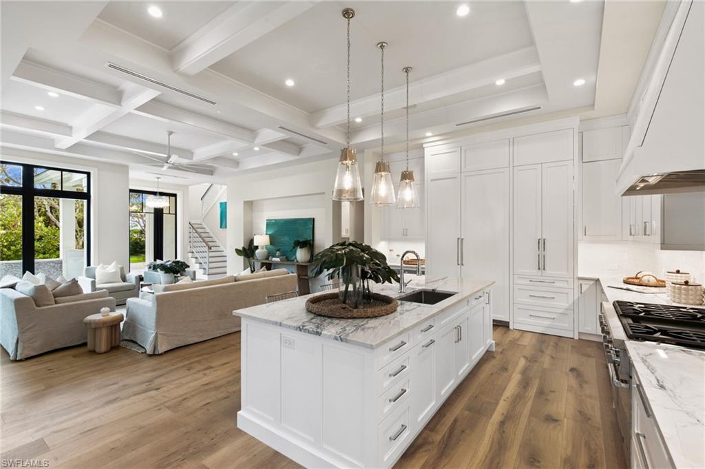 1191 7th Avenue North Naples, FL 34102 - Photo 6 of 49 Quartzite Stone and Best Line Cabinets guarantee a lasting quality home