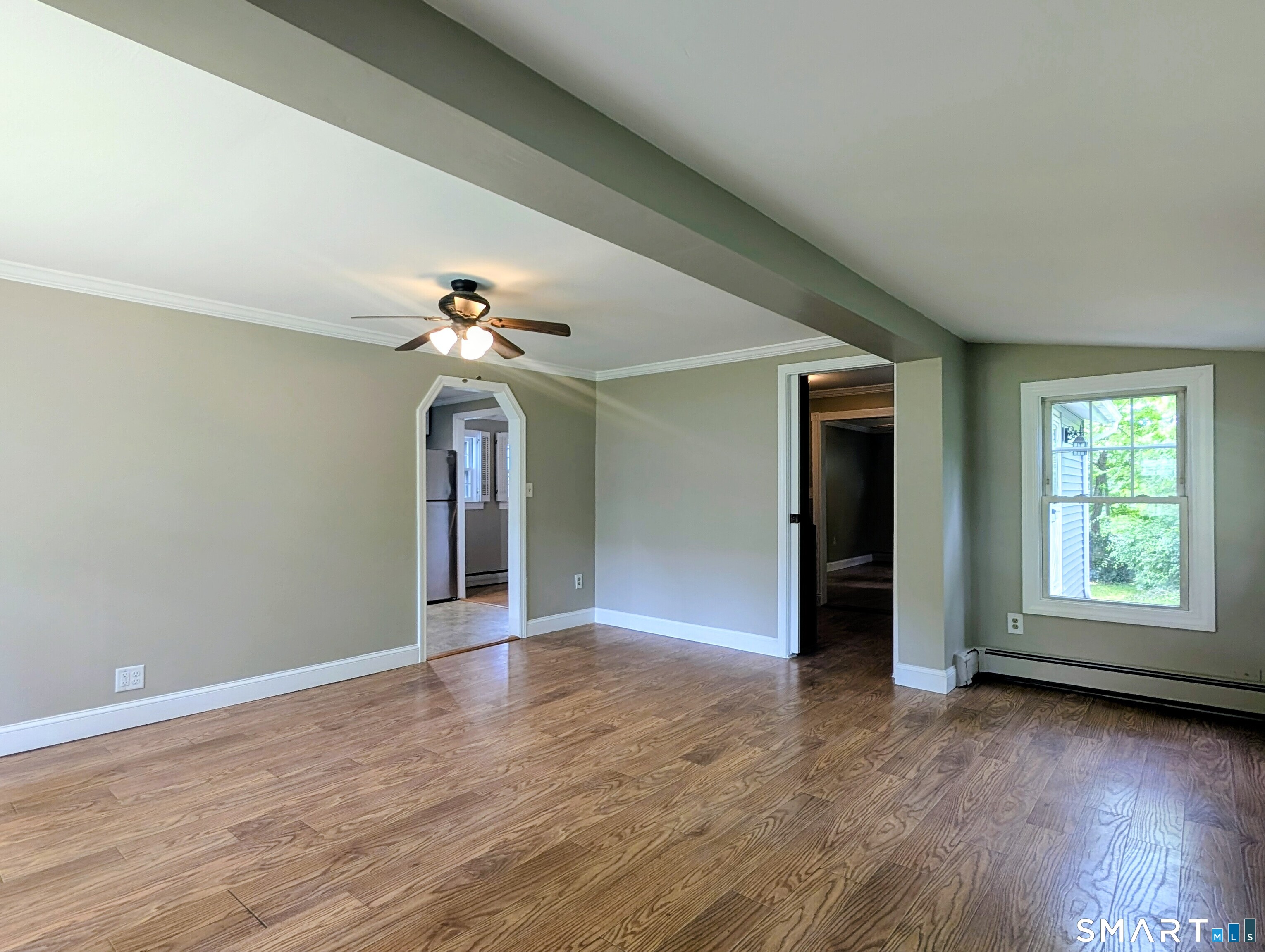 173 Daly Road Coventry, CT 06238 - Photo 10 of 27 Living Room looking towards the primary bedroom and also towards the kitchen.